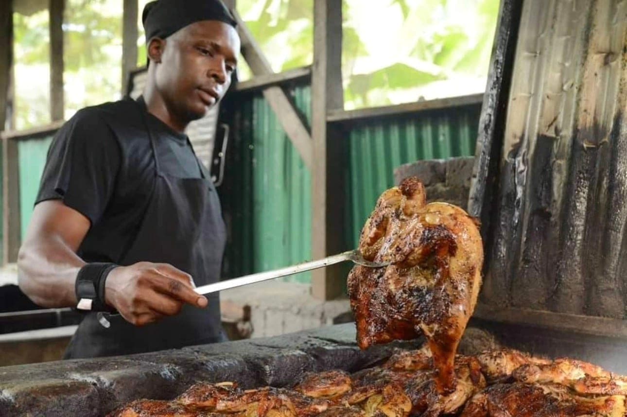 Jerk chicken lifted off the pan