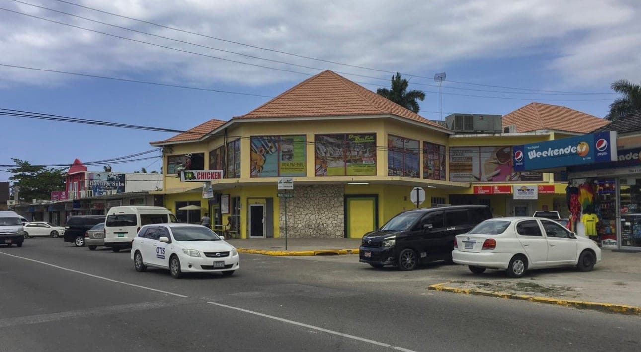 A roadside plaza of small businesses, Montego Bay